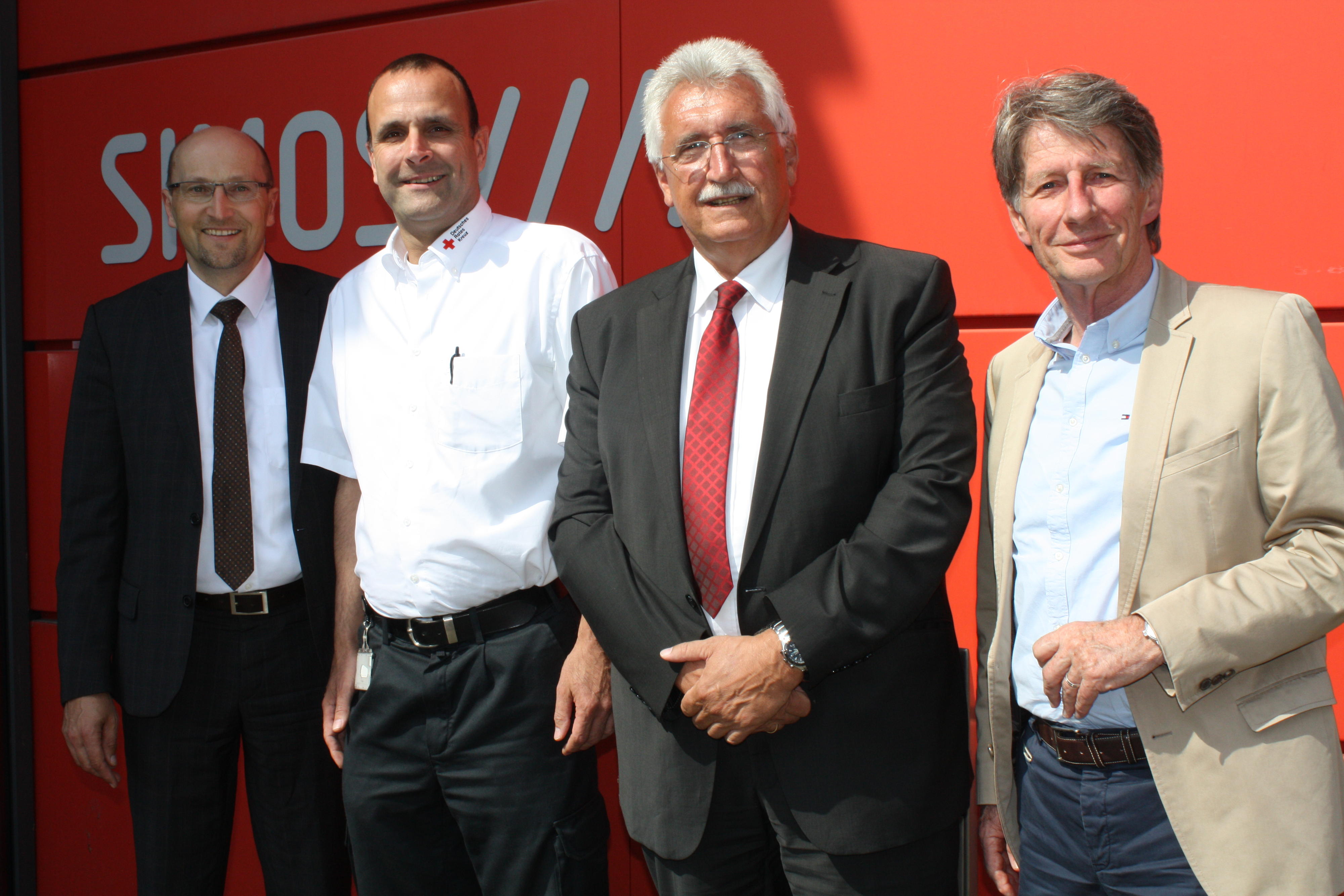 Vier Männer bei der Vorstellung der Integrierten Leitstelle Stuttgart