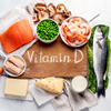 Das Bild zeigt ein Brett mit dem Wort Vitamin D und Lebensmittel, die reich an Vitamin D sind.