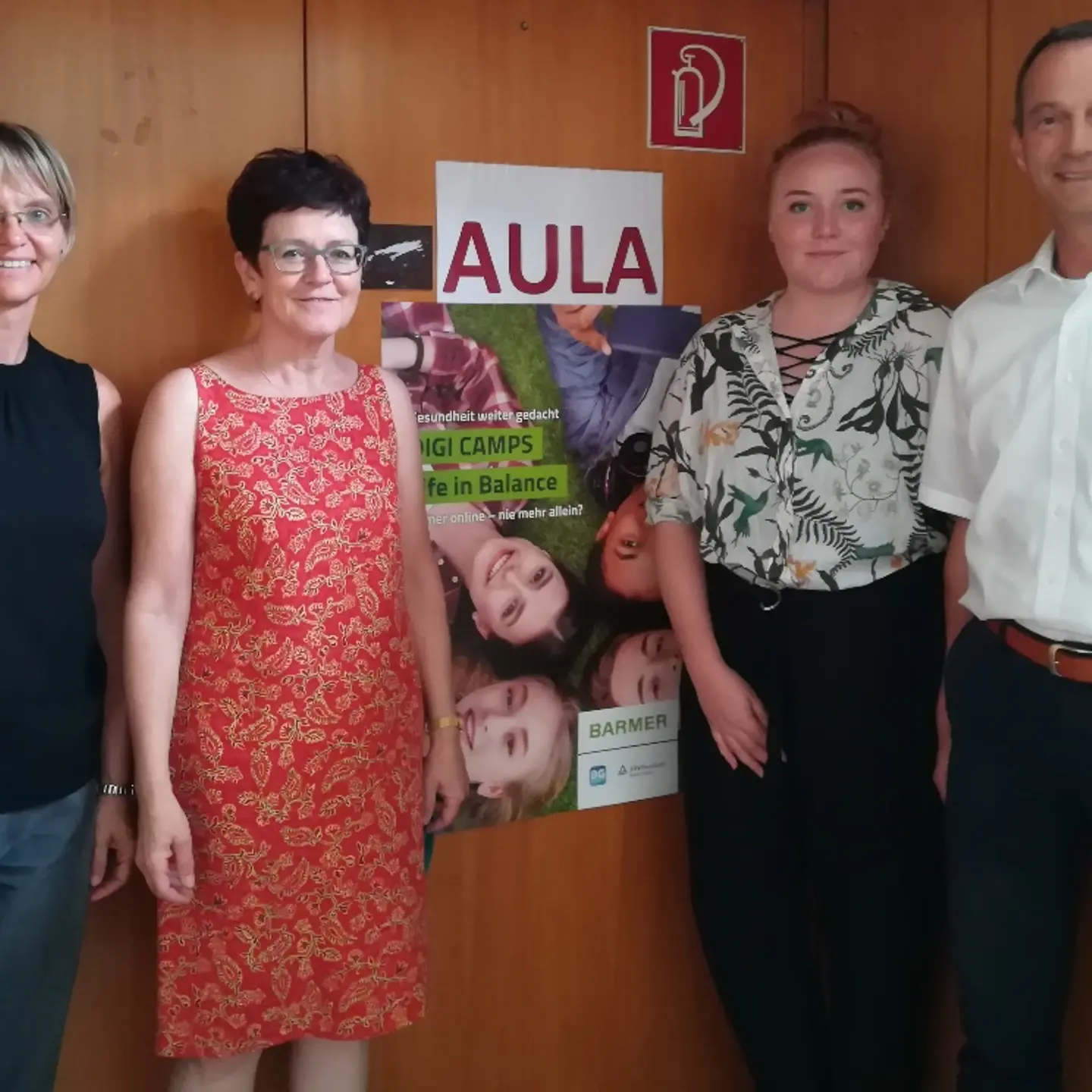 Lehrer und Veranstalter beim DIGI CAMP Saarlouis vor einer Wand