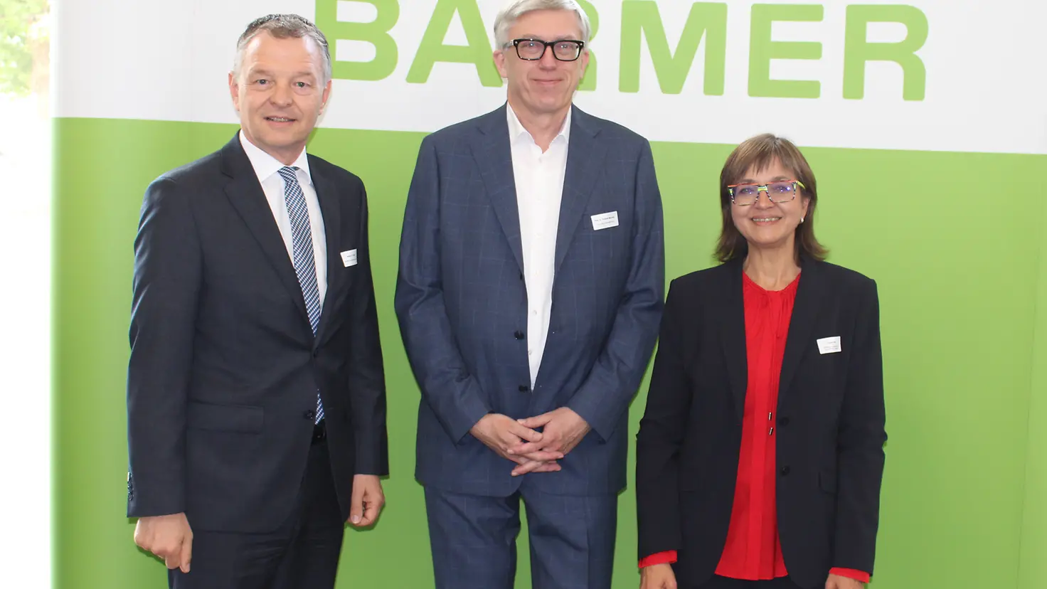 Länderforum Gesundheit: Norbert Sudhoff, Professor Mansky und Dunka Kleis vor einer BARMER Stellwand