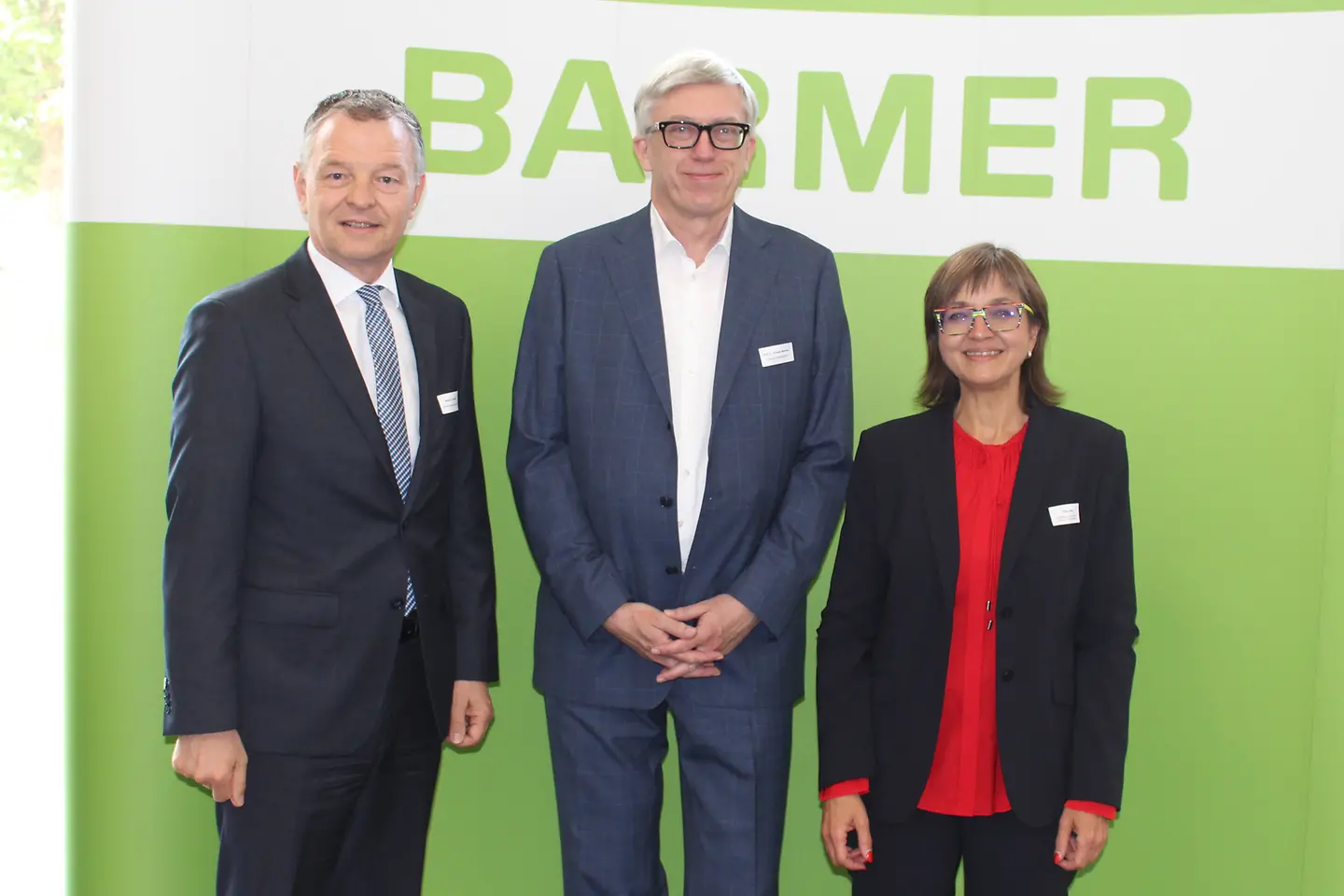 Länderforum Gesundheit: Norbert Sudhoff, Professor Mansky und Dunka Kleis vor einer BARMER Stellwand