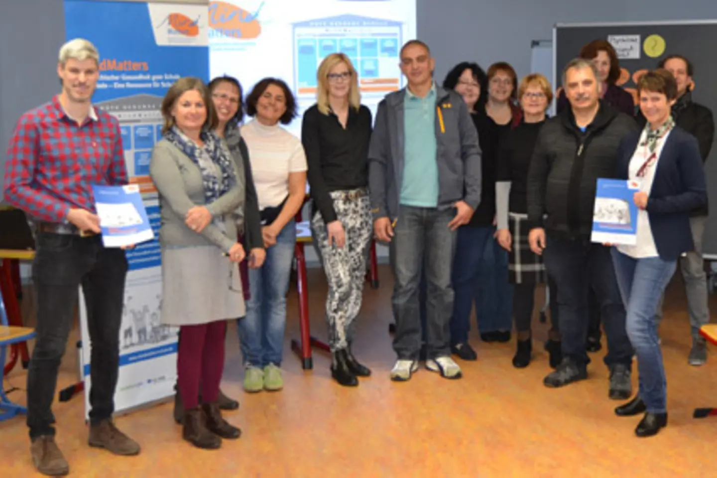 Gruppenfoto Gabi Paus und Oliver Schmidt mit Lehrern aus Saarbrücken