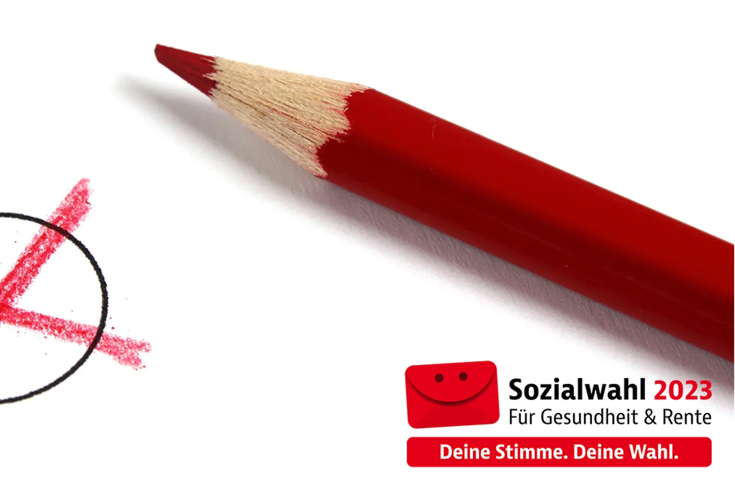 Zu sehen ist ein roter Stift mit Wahlkreuz in Kreis